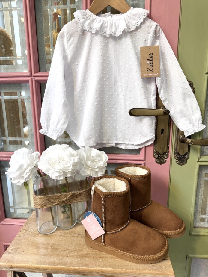 Camisa con volante para bebé