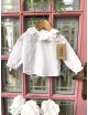 Camisa con volante para bebé